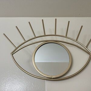 Gold Eye-Shaped Wall Mirror